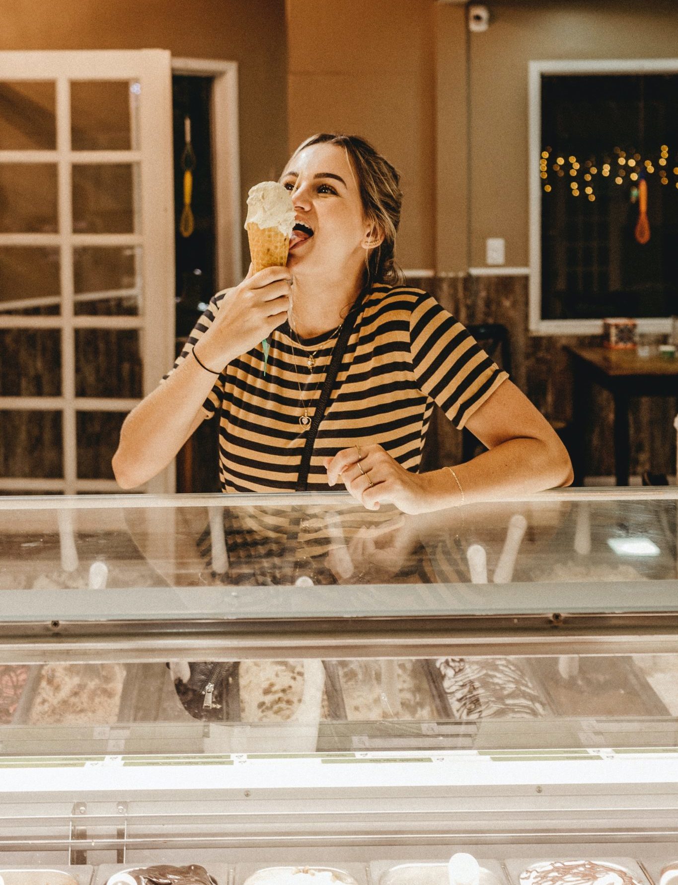 person happily eating ice cream