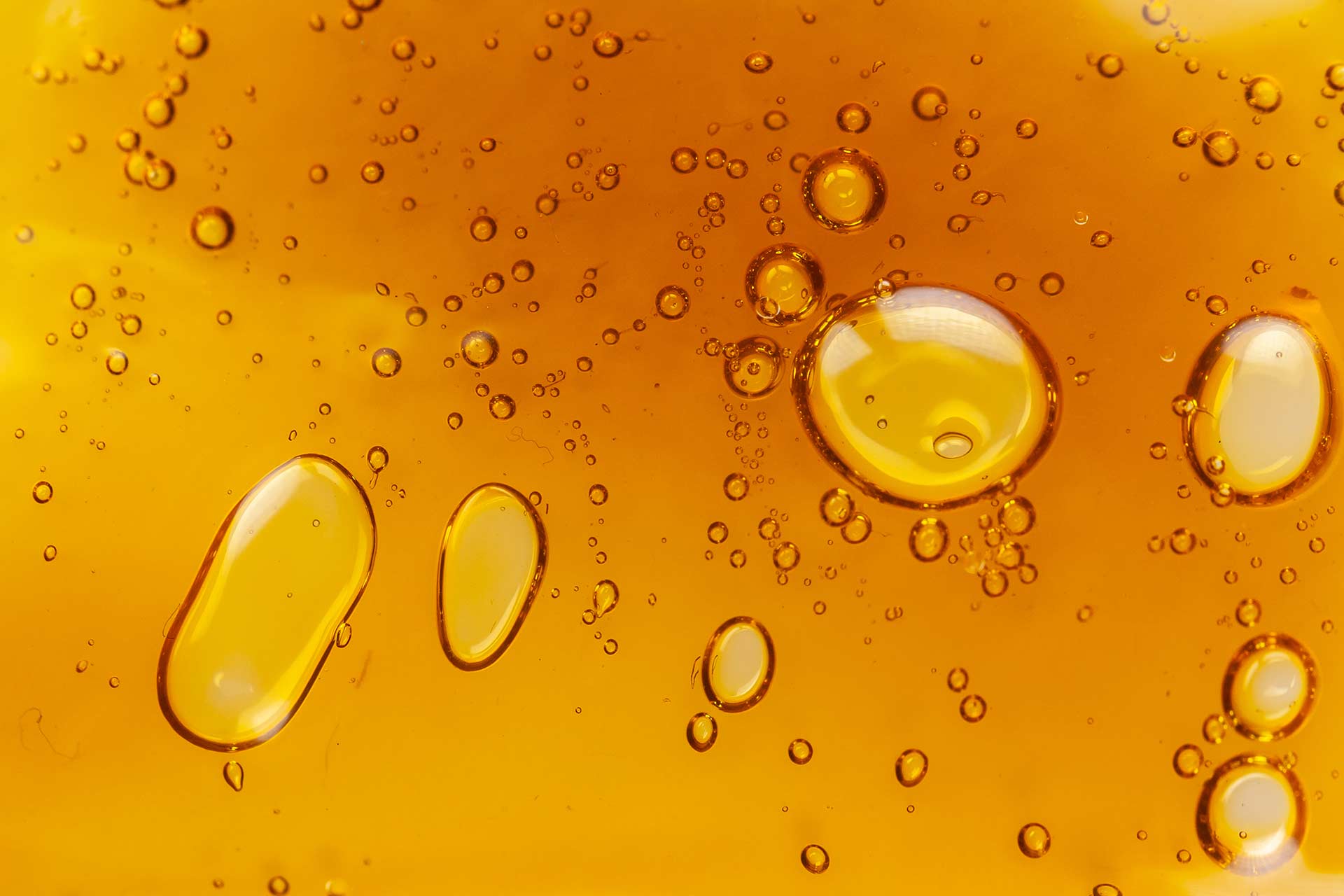 bubbles in amber colored distillate