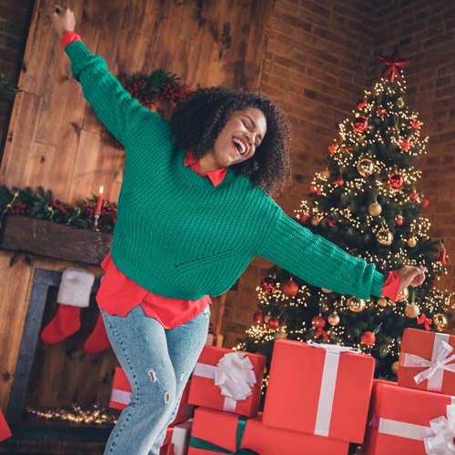 Photo of black woman happy positive smile have fun dance decoration present box christmas time indoors