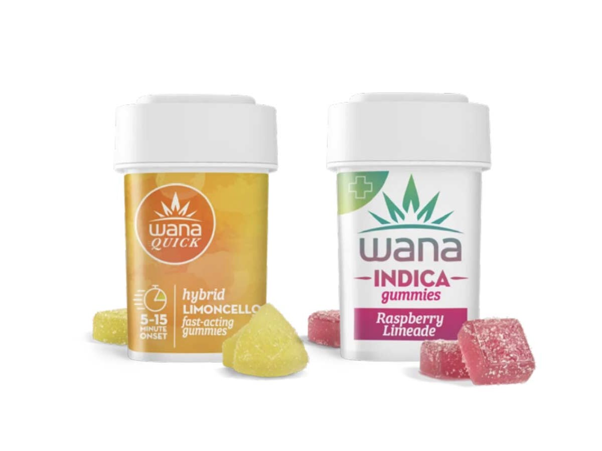 Containers of Wana Quick Hybrid Limoncello fast-acting THC gummies and Wana Indica Raspberry Limeade cannabis gummies, shown with yellow and red edibles in the foreground.